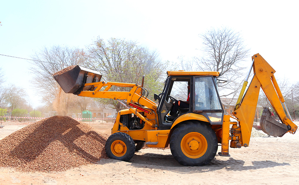 Road construction machinery in * * * road construction