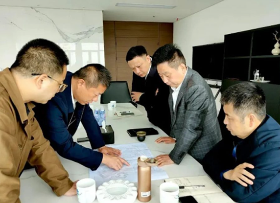 Economic development District Party Working Committee secretary Ole line to Hualian porcelain industry research